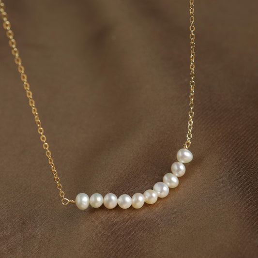 Smile Collation Curved Smile Rice pearl Necklace